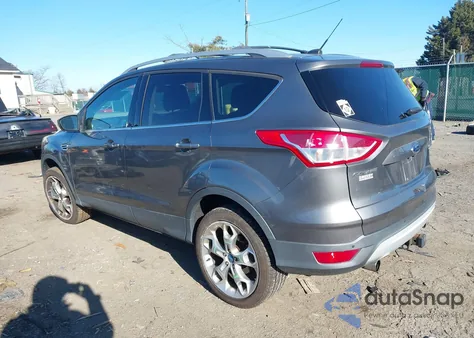 2013 Ford Escape Titanium z USA, uszkodzony, nr VIN 1FMCU9J92DUC99598